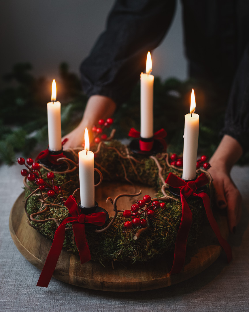 A festive arrangement with glowing candles